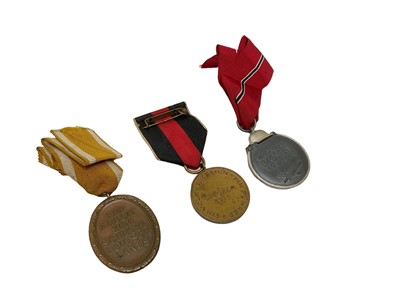 Lot 839 - Three Nazi War Medals comprising West Wall Medal, Sudetenland Medal and Eastern Front medal (3)