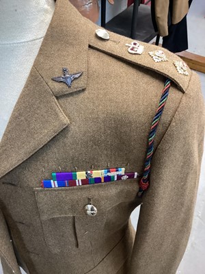 Lot 877 - Elizabeth II Parachute Regiment No2 Service Dress jacket and trousers in Colonels' rank and Para Reg collar dogs, wings, and medal ribbons.