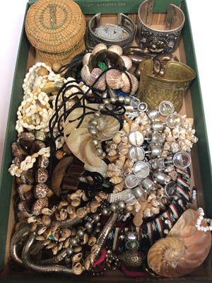 Lot 182 - Group of tribal style jewellery, various shell necklaces, white metal bangles and earrings