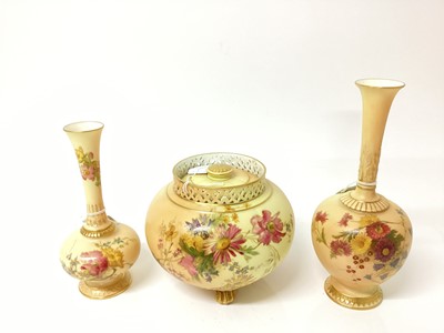 Lot 1275 - Royal Worcester blush ivory pot pourri and cover with gilded and floral decoration, 14cm high, together with two slender neck vases, numbered 1661 and 1733 (3)