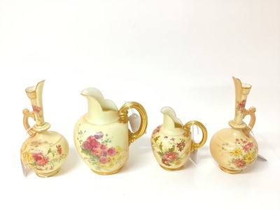 Lot 1276 - Group of Royal Worcester bush ivory porcelain with gilded and floral decoration to include two jugs, numbered 1094 and two ewers, numbered 783 (4)
