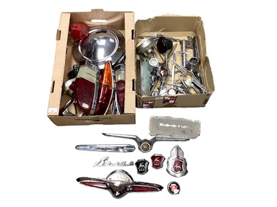 Lot 2167 - Large collection of GAZ Volga Soviet car badges, lights and various chrome parts (2 boxes)