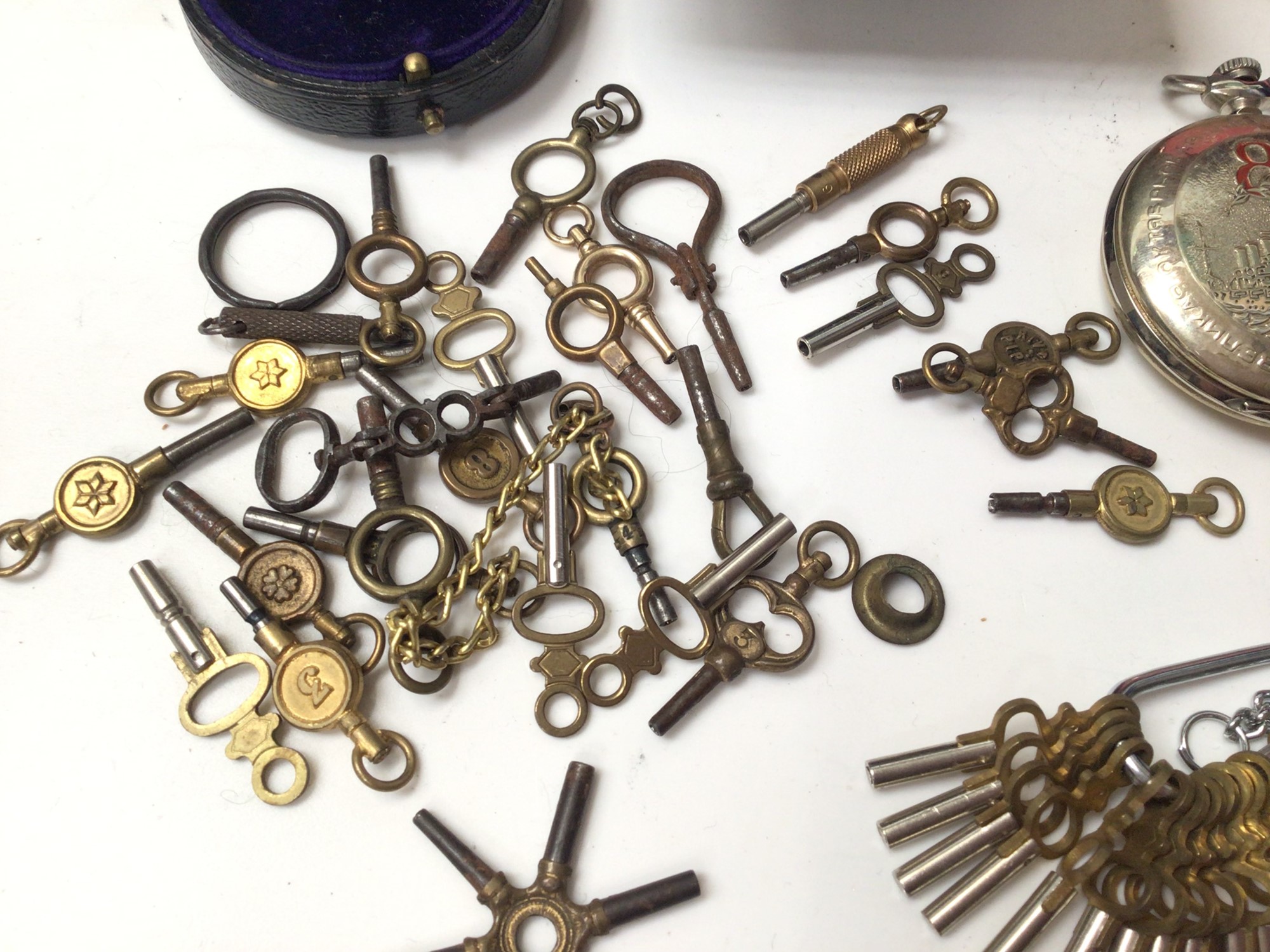 Lot 199 Collection of pocket watch winding keys, two