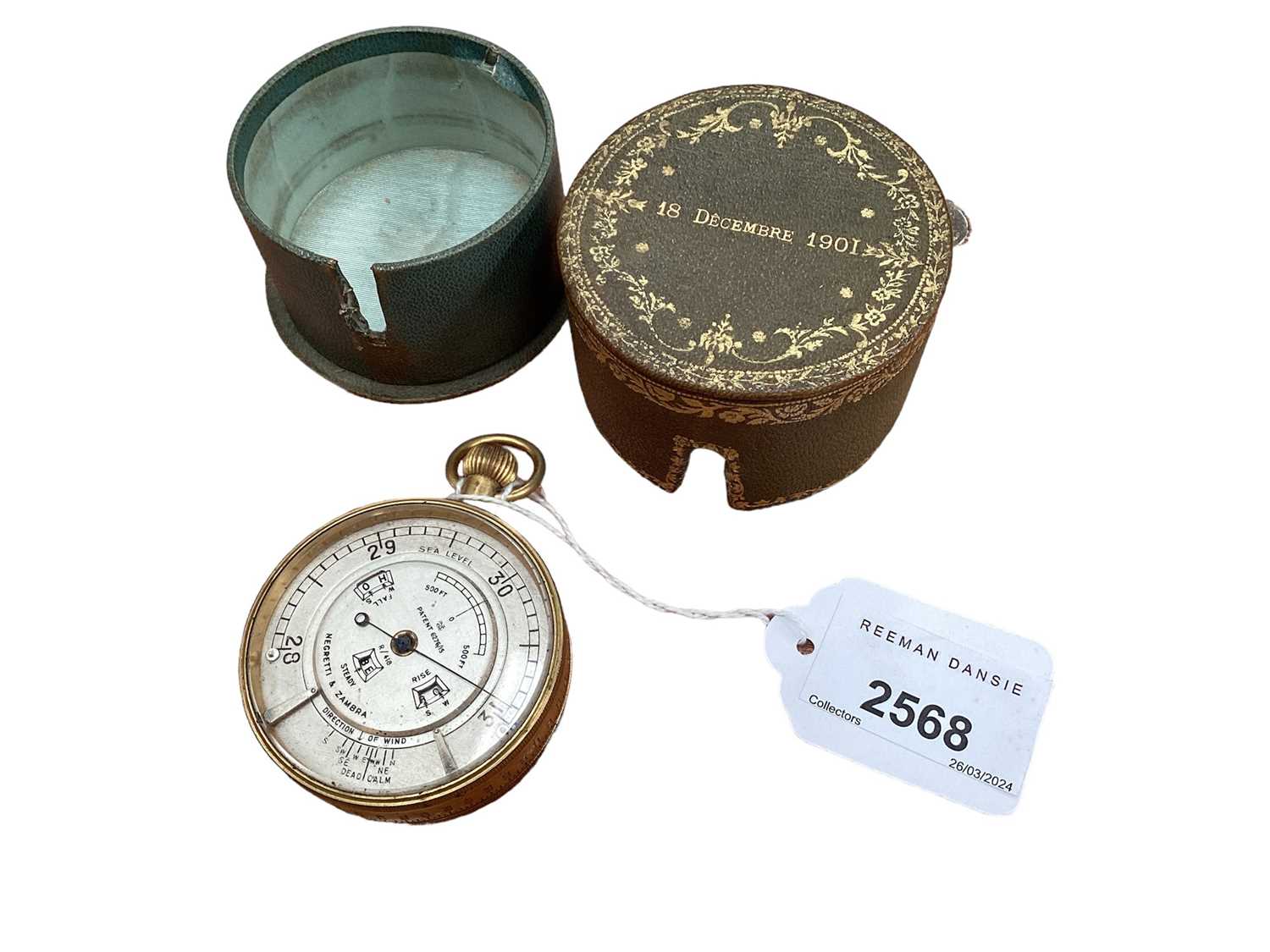 Lot 2568 - Early 20th century Negretti & Zambra Gilt Brass Weather Watch English, engraved to the silvered face 'Negretti & Zambra',  rear of case with letter codes for forecasts