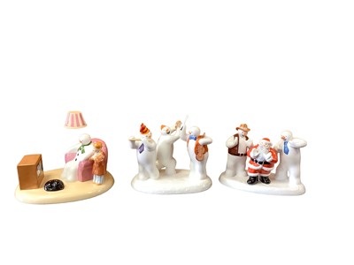 Lot 1279 - Four Coalport Characters limited edition The Snowman figures - The Band Plays On, By The Fireside, A Cold Night In and All Together Now, together with Father Christmas figure - Line Dancing, all bo...