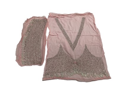 Lot 2133 - 1920s salesman's samples of beaded dress designs on two cream silk chiffon panels plus the top portion of a uncut beaded dress pattern on pink and cream silk.