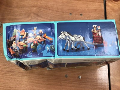 Lot 2012 - CEJI Asterix & Obelix's Motorised Gallic Chariot & Fortress, both in poor boxes (2)