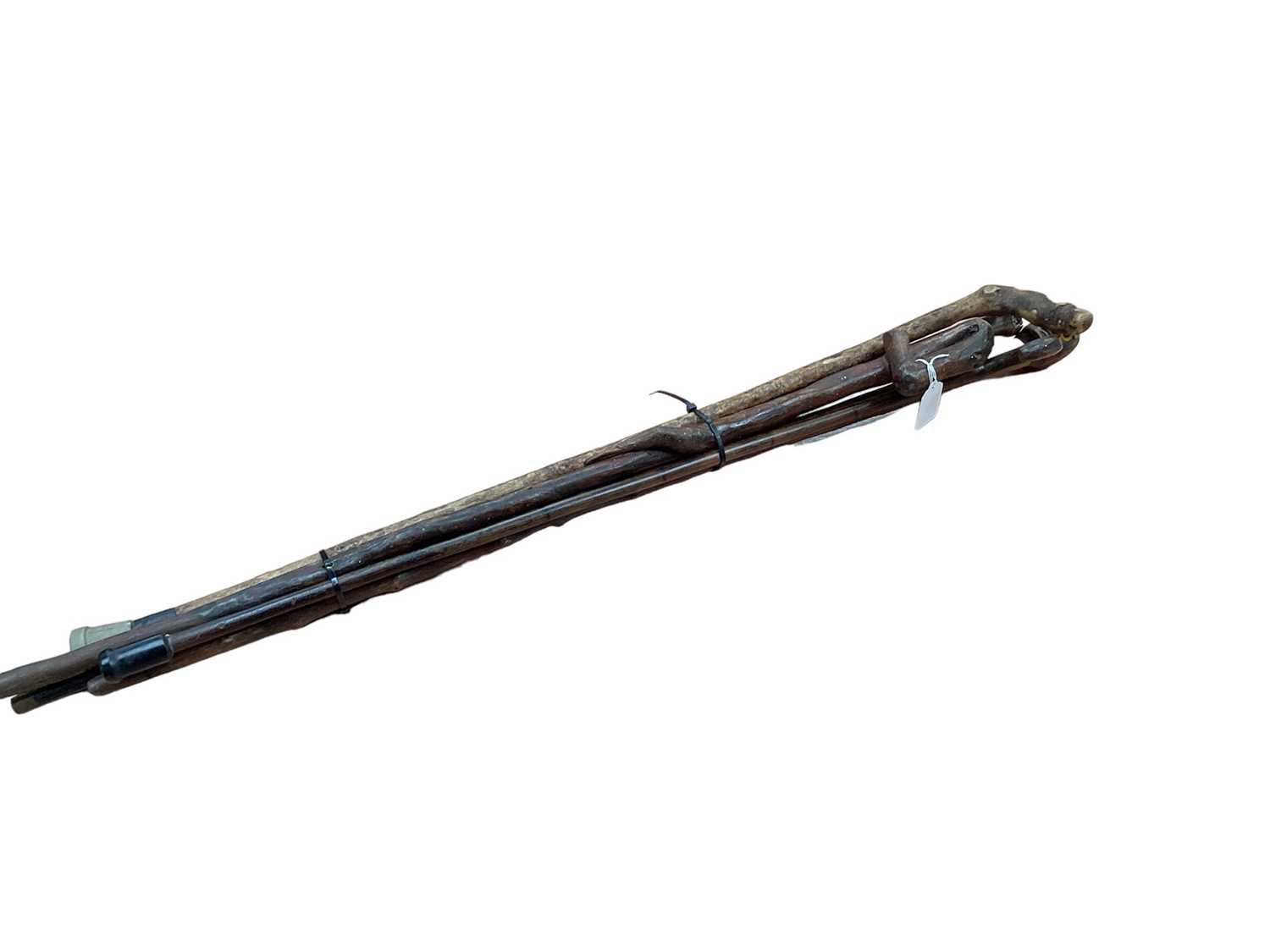 Lot 2553 - Georgian rustic walking stick dated 1835 with novelty man's head knop and glass eyes and four others (5)