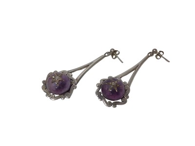 Lot 485 - Pair of cabochon amethyst and diamond pendant earrings in later silver setting