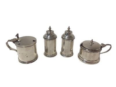 Lot 286 - Silver mustard pot, together with another and two silver pepperettes