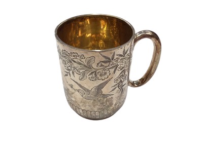 Lot 265 - Victorian silver christening mug with engraved decoration of birds, (London 1885)