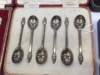 Lot 268 - Set of six Elizabeth II silver tea spoons in a fitted case, (Sheffield 1962), together with another cased set of six silver spoons, cased set of silver pickle forks and a cased silver spoon and for...