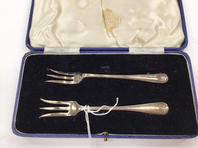 Lot 268 - Set of six Elizabeth II silver tea spoons in a fitted case, (Sheffield 1962), together with another cased set of six silver spoons, cased set of silver pickle forks and a cased silver spoon and for...
