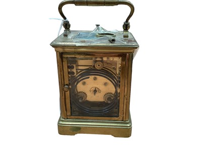 Lot 2583 - Old brass repeating carriage clock striking on gong with key 16cm