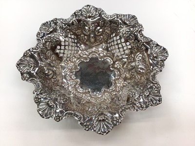 Lot 272 - Victorian silver bonbon dish, (Chester 1897) together with a silver photograph frame (2).