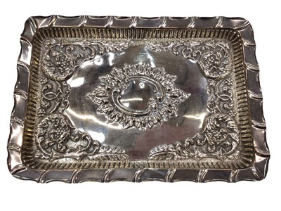 Lot 273 - Edwardian sliver dressing table tray with embossed decoration, (Sheffield 1904), maker Walker & Hall.