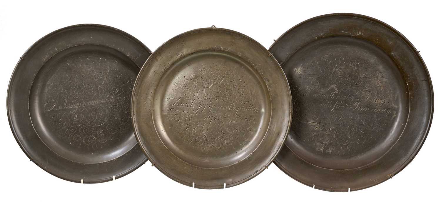 Lot 827 - Three antique pewter chargers engraved with verse