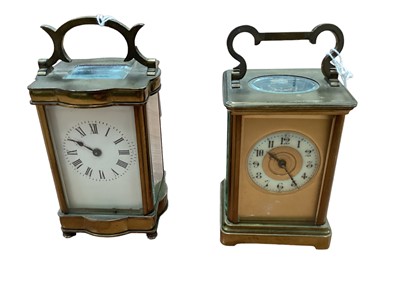 Lot 2592 - Two antique French brass carriage clocks