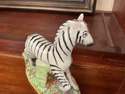 Lot 63 - Extensive collection of Staffordshire zebras