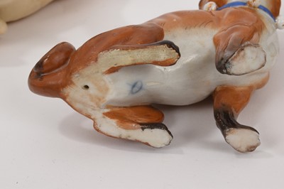 Lot 125 - Meissen pug and two similar pugs