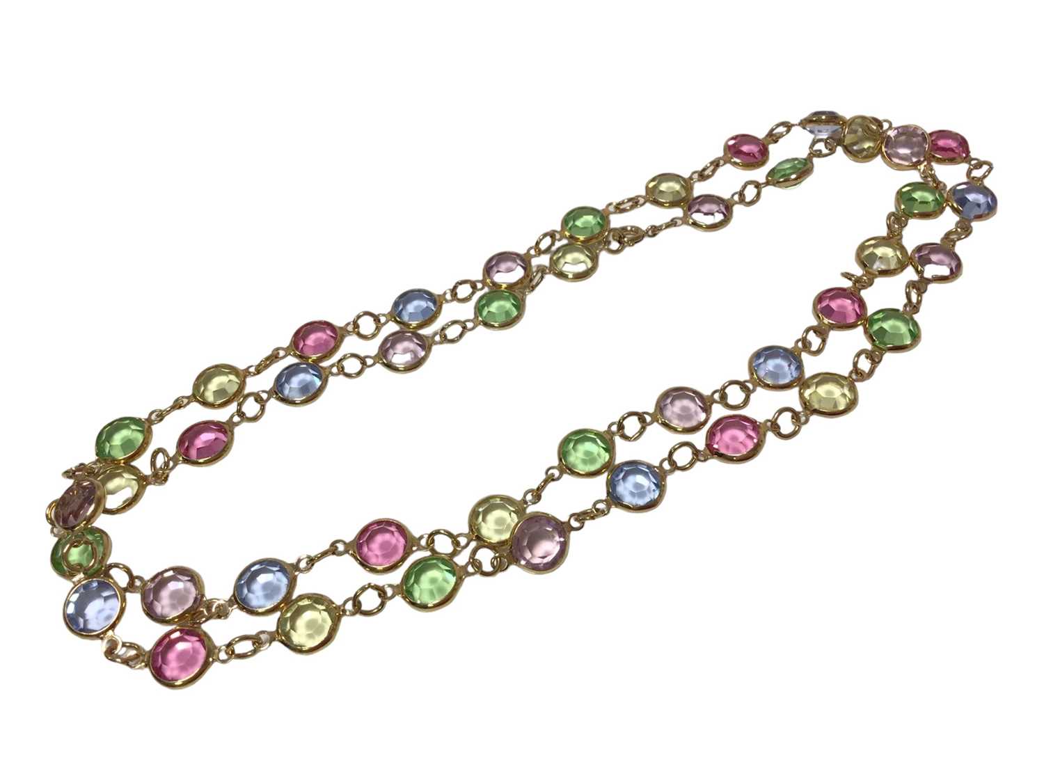 Lot 567 - Multi-gem necklace with spectacle setting