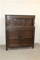 Lot 1409 - 19th century carved oak court cupboard with...