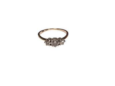 Lot 303 - Diamond three stone ring with three brilliant cut diamonds in platinum claw setting on 18ct gold shank