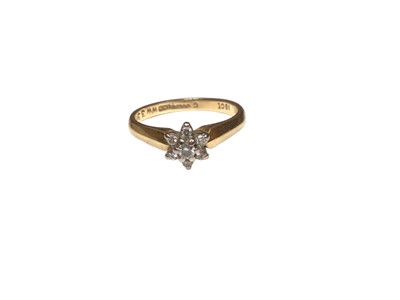 Lot 304 - Diamond cluster ring with a flower head cluster of seven brilliant cut diamonds in 18ct gold setting