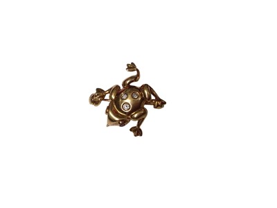 Lot 306 - 18ct gold novelty brooch in the form of a frog with ruby eyes and diamond set body