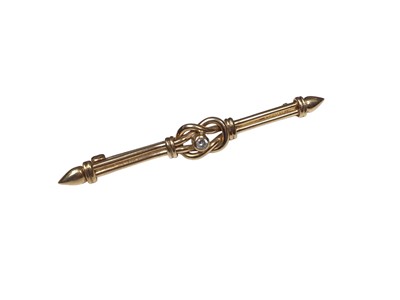 Lot 308 - Edwardian style 9ct gold and diamond bar brooch with lovers knot design