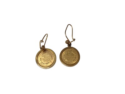 Lot 310 - Pair of 19th century American 1 Dollar coins, 1853, in gold earring mounts