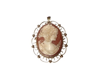 Lot 312 - Carved shell cameo pendant/brooch in 9ct gold mount, 45mm.