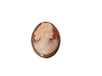 Lot 315 - Carved shell cameo brooch with gold mount, marked 14k. 38mm