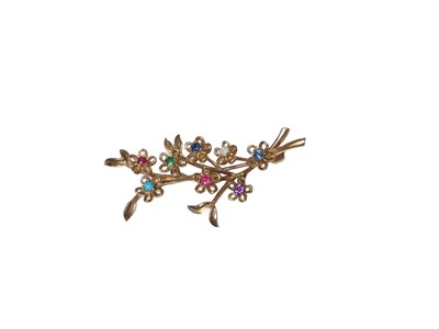 Lot 316 - Gold and multi-gem floral spray brooch in 9ct gold setting, 45mm.