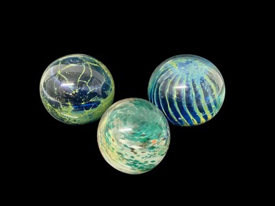 Lot 1298 - Selection of coloured glass including three Mdina paperweights