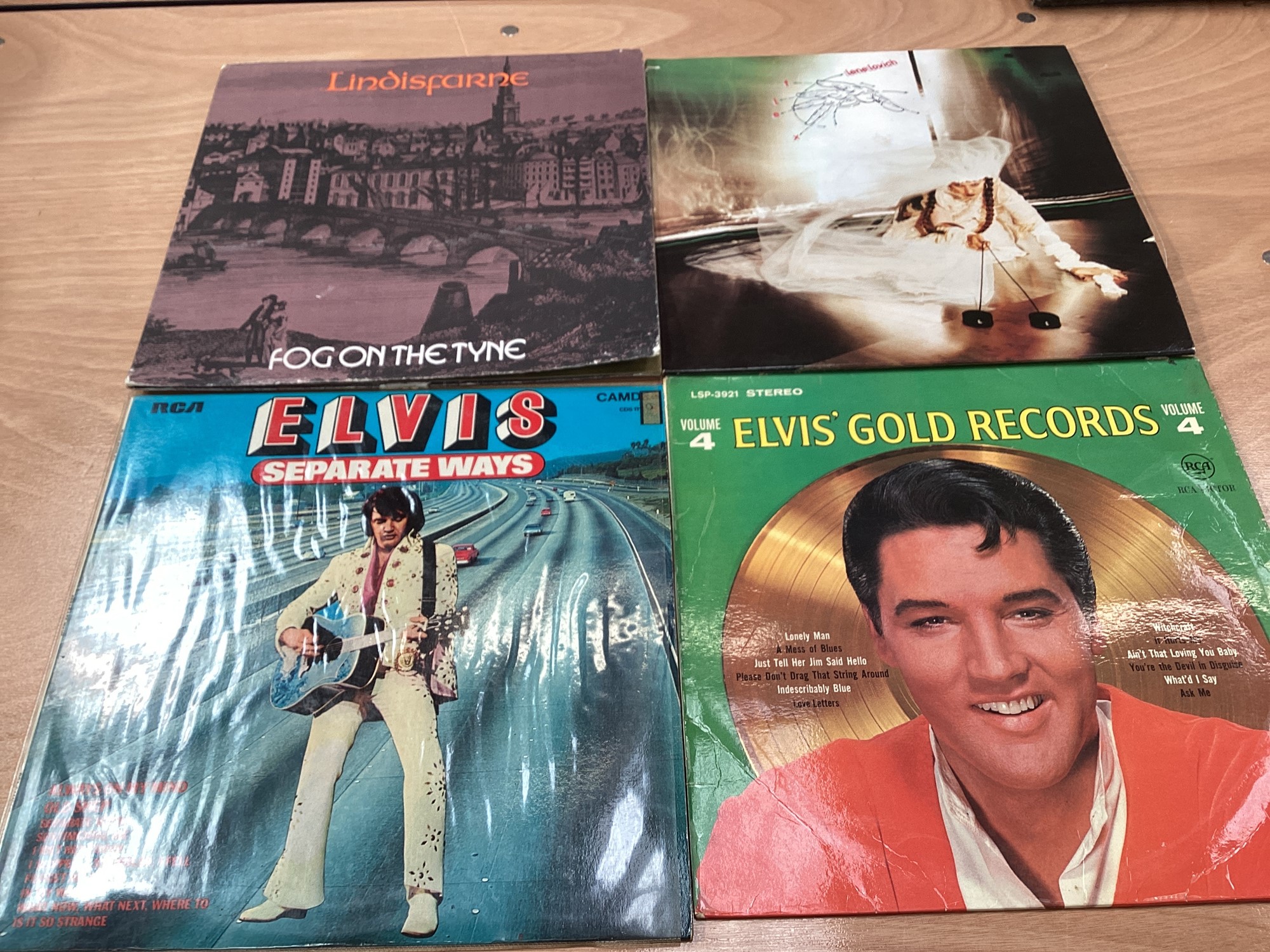 Vintage case of LP records including Lindisfarne, Lene Lovich, Kraftwerk...