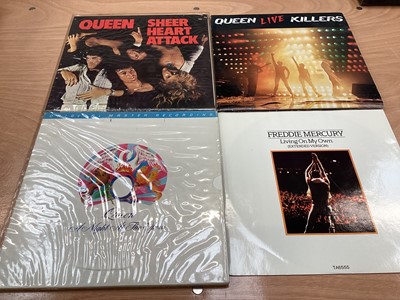 Lot 2287 - Vintage case of Queen LP's and 12 inch singles