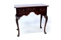 Lot 1425 - 18th century mahogany lowboy, the moulded...