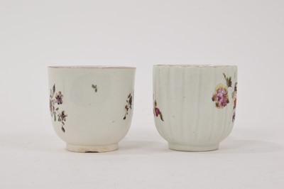 Lot 97 - Derby coffee cup, painted with flowers, circa 1760, and a similar Derby ribbed coffee cup, circa 1758