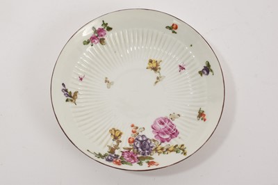 Lot 67 - Derby ribbed tea bowl and saucer, painted with flowers, circa 1758
