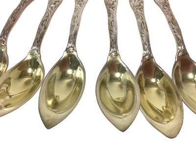 Lot 360 - Set of six Tiffany silver gilt Chrysanthemum pattern fruit/orange spoons