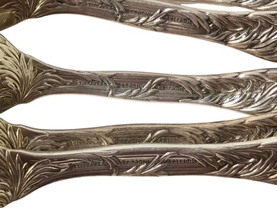 Lot 360 - Set of six Tiffany silver gilt Chrysanthemum pattern fruit/orange spoons