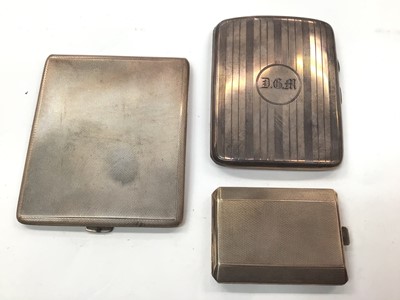 Lot 1023 - Two silver cigarette cases and a silver matchbook case (3)