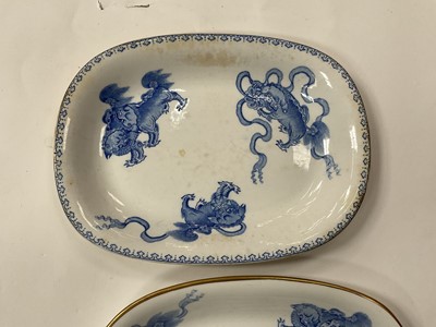 Lot 82 - Two Wedgwood bone china teapot stands, printed in blue in Chinese style