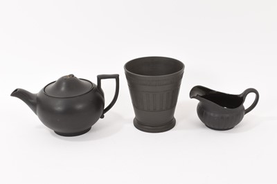 Lot 51 - Wedgwood black basalt vase, a milk jug and a teapot and cover