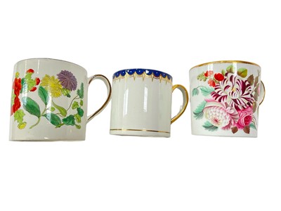 Lot 179 - Wedgwood pearlware mug, printed and painted with flowers, and two coffee cans