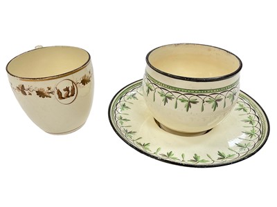 Lot 182 - Wedgwood creamware tea bowl and trembleuse saucer, and a Wedgwood crested coffee cup