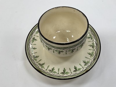 Lot 182 - Wedgwood creamware tea bowl and trembleuse saucer, and a Wedgwood crested coffee cup