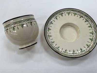 Lot 182 - Wedgwood creamware tea bowl and trembleuse saucer, and a Wedgwood crested coffee cup