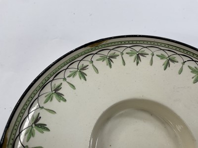 Lot 182 - Wedgwood creamware tea bowl and trembleuse saucer, and a Wedgwood crested coffee cup